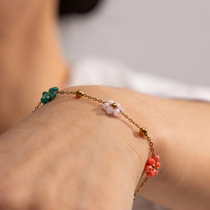 Collier avec pendentif fleur en cristal coloré